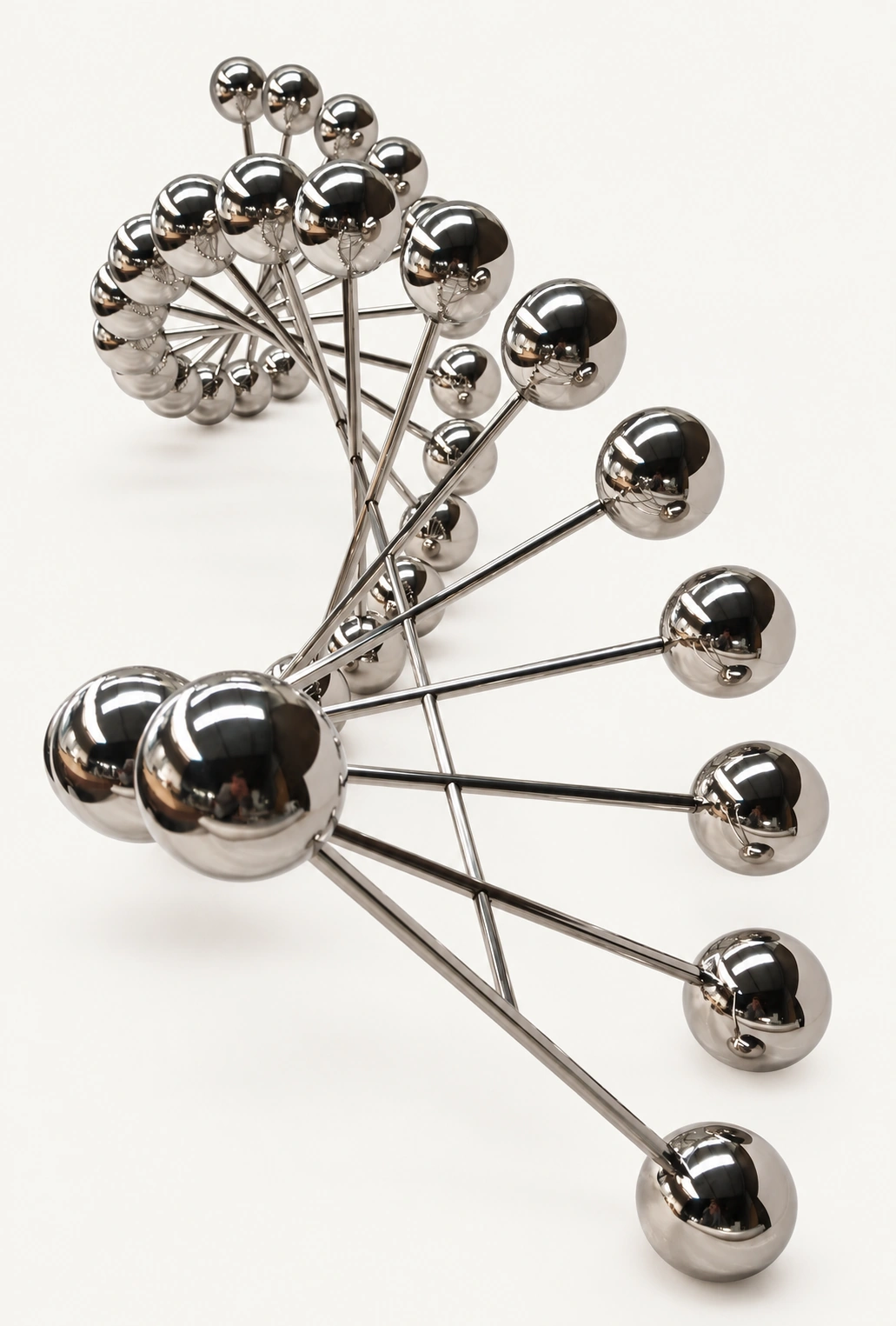 Spiral sculpture assembled from metal spheres and rods