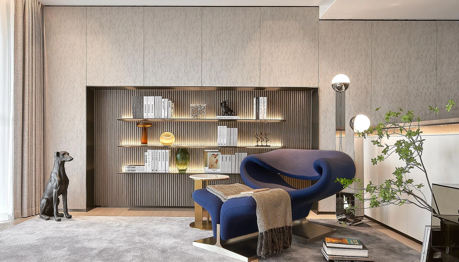 Recessed book niche — fluted metal backdrop