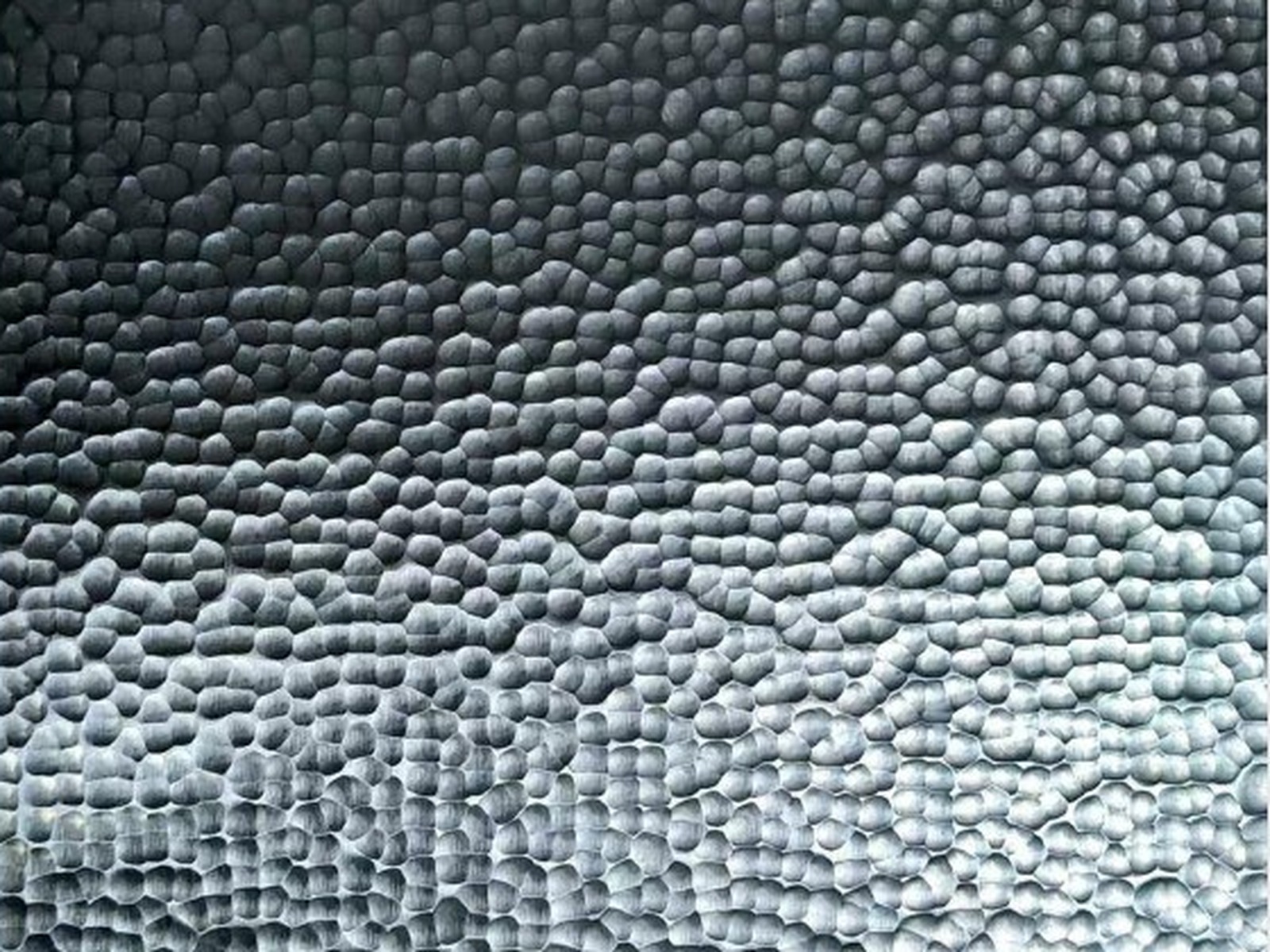 Close view of hammered stainless steel texture