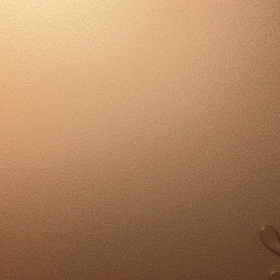 Warm metallic sandblasted finish reference from the existing materials archive.