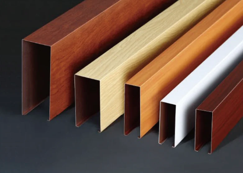 U-shaped aluminum baffles in wood-look and plain-color finishes.