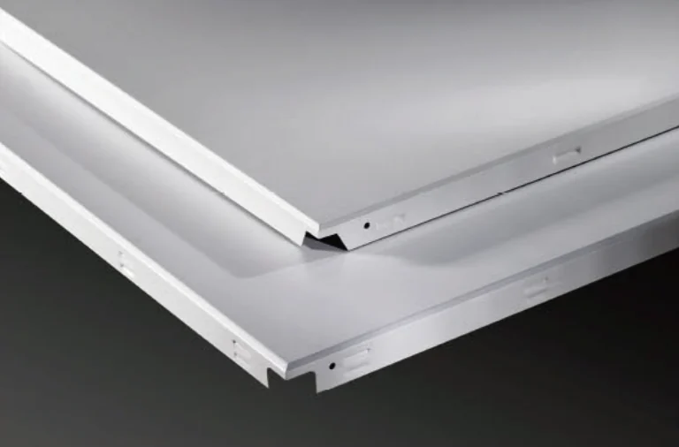Folded edges of flat aluminum ceiling panels.