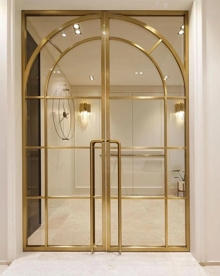Arched metalwork & clear glass
