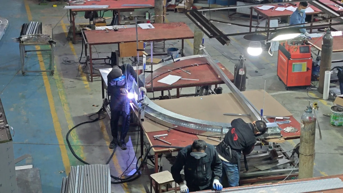 Metal-component welding and assembly in the LMC workshop
