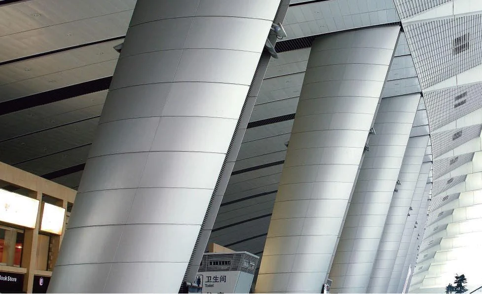 Curved aluminum column cladding illustrated in the catalog
