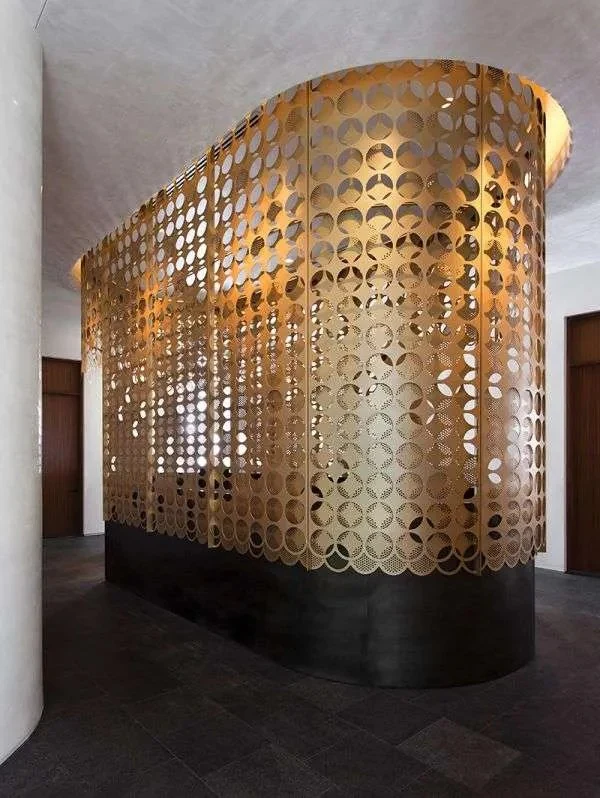 Reference for perforated metal cladding and filtered light